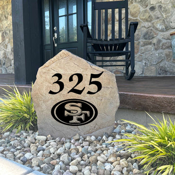 Decorative San Francisco 49ers Address Stone featuring personalized house numbers permanently engraved into the stone surface alongside officially licensed team graphics. Perfect for driveways, patios, gardens, and landscape beds, this address marker celebrates 49ers football tradition.