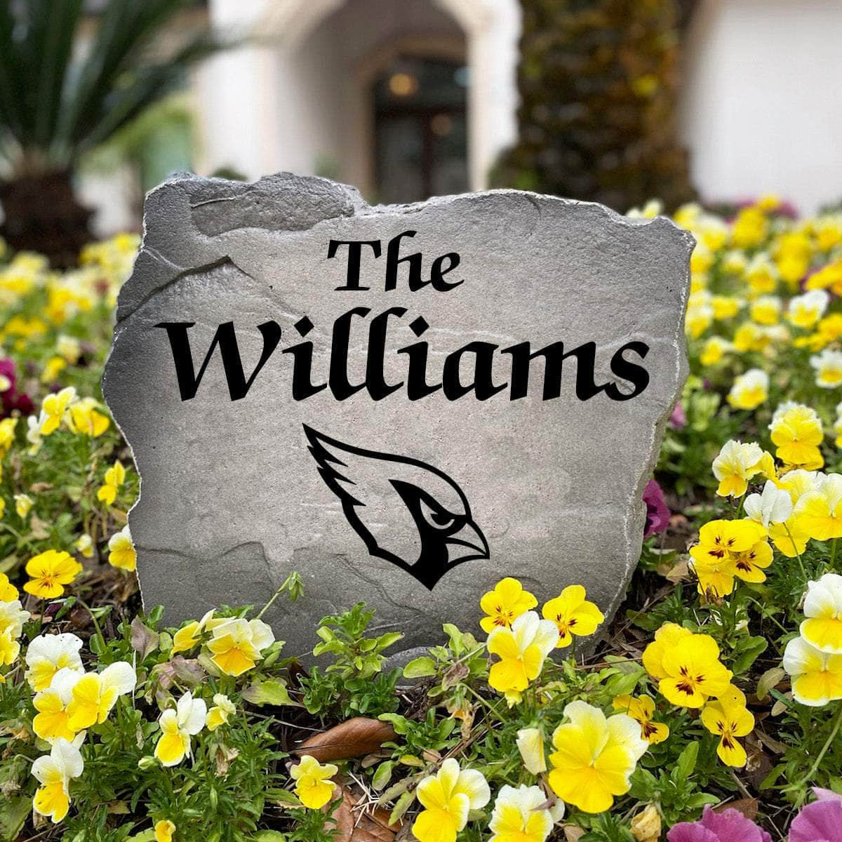 Personalized Arizona Cardinals outdoor name stone featuring custom family lettering permanently engraved into premium stone. A unique gift for football fans, housewarmings, birthdays, and new homeowners.