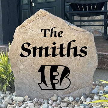 Officially licensed Cincinnati Bengals Name Stone personalized with your family name and engraved directly into durable stone. This custom landscape accent showcases Bengals pride while adding a welcoming touch to your home.