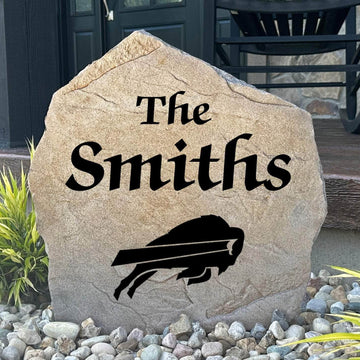 Officially licensed Buffalo Bills Name Stone personalized with your family name and engraved directly into durable stone. This custom landscape accent showcases Bills pride while creating a warm welcome for guests.
