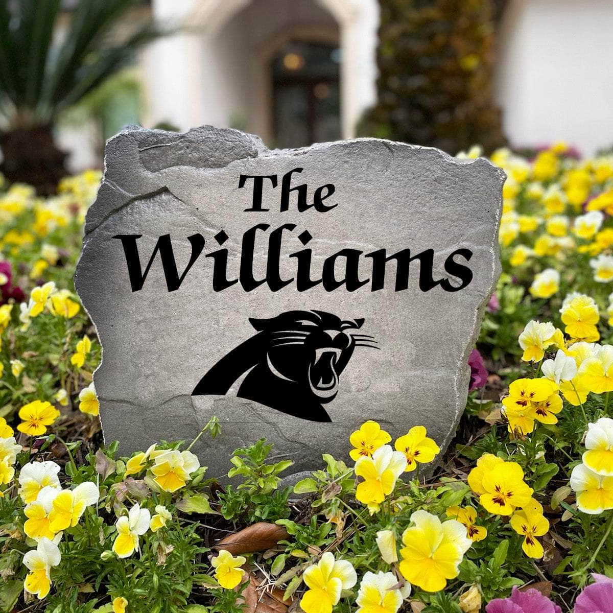 Personalized outdoor Carolina Panthers Name Stone with custom family lettering permanently engraved into premium stone. A unique gift for Panthers fans, homeowners, housewarmings, and football enthusiasts.
