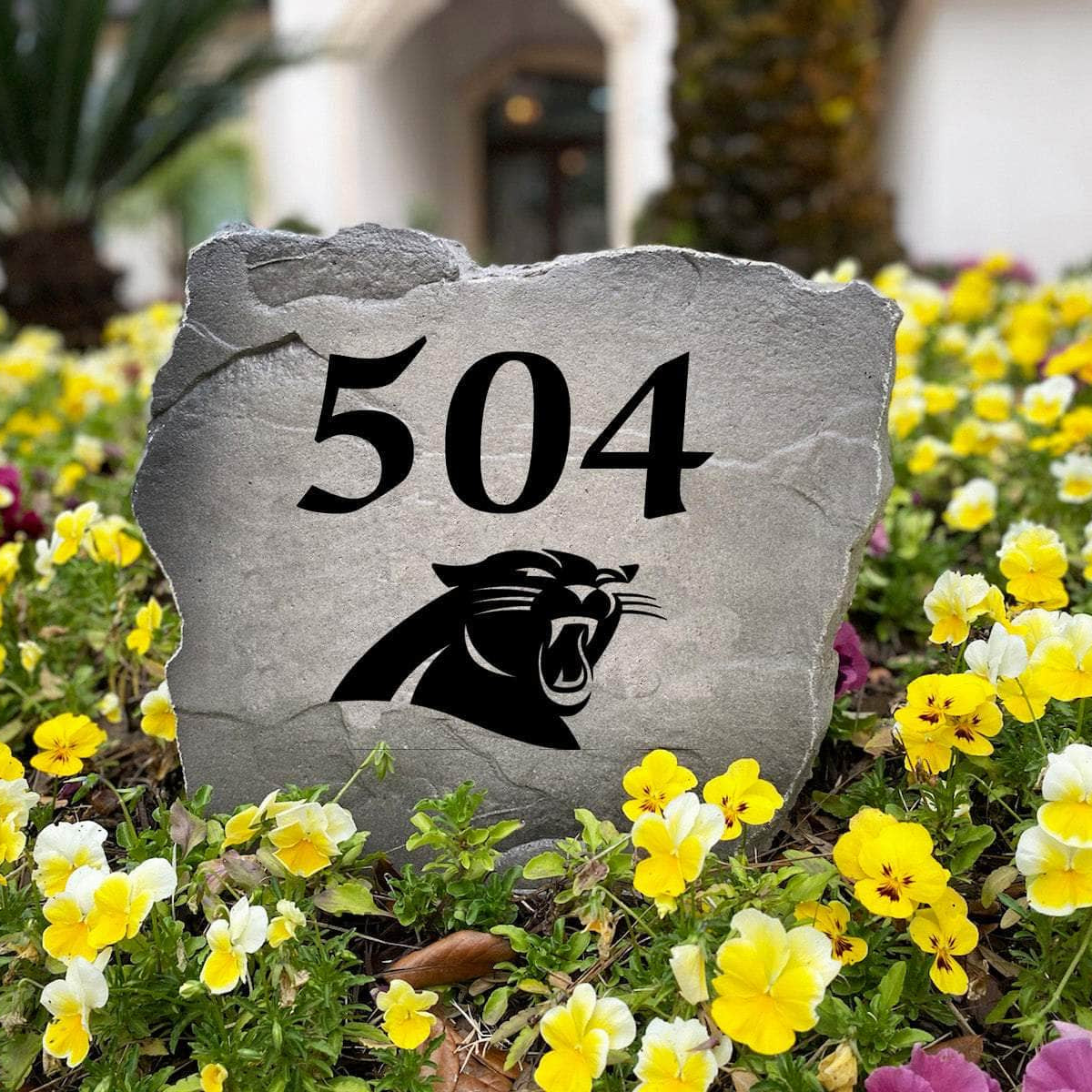 Personalized outdoor Carolina Panthers Address Stone featuring custom house numbers permanently engraved into premium stone. A unique landscape accent and thoughtful gift for football fans, new homeowners, and Panthers supporters.