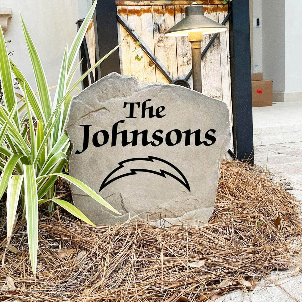 Engraved Los Angeles Chargers Name Stone with a custom family name and the official Los Angeles Chargers logo, bringing football spirit and timeless style to front yard landscapes, walkways, and home entrances.