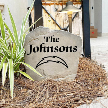Engraved Los Angeles Chargers Name Stone with a custom family name and the official Los Angeles Chargers logo, bringing football spirit and timeless style to front yard landscapes, walkways, and home entrances.