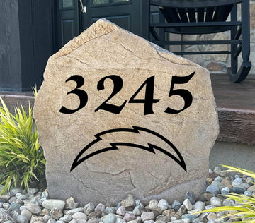 Officially licensed Los Angeles Chargers Address Stone featuring custom house numbers and the iconic Los Angeles Chargers logo engraved directly into the stone surface. This personalized address stone adds NFL team pride and enhances curb appeal for front yards, gardens, driveways, and entryways.