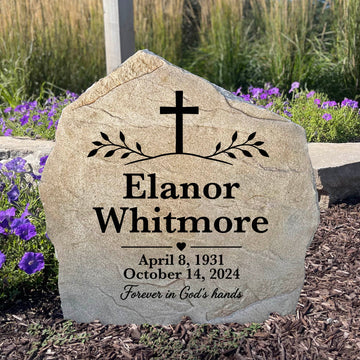 Cross of Remembrance personalized memorial stone engraved with a loved one's name for a peaceful memorial garden