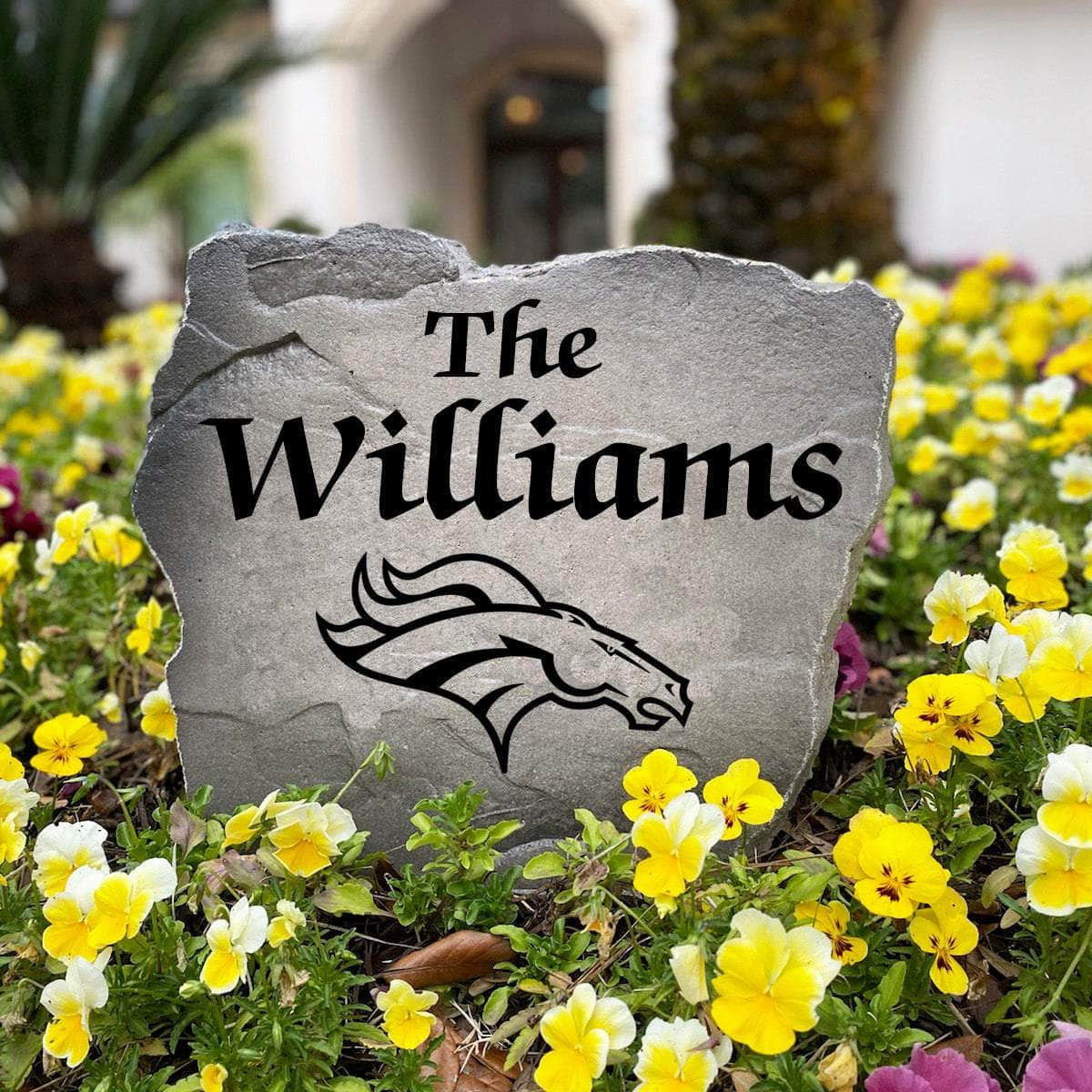 Officially licensed Denver Broncos Name Stone handcrafted in the USA with custom family engraving and durable team artwork. Available in Sandstone and Greystone finishes, this decorative garden stone enhances landscape beds, patios, and outdoor living spaces with lasting beauty and NFL team pride.