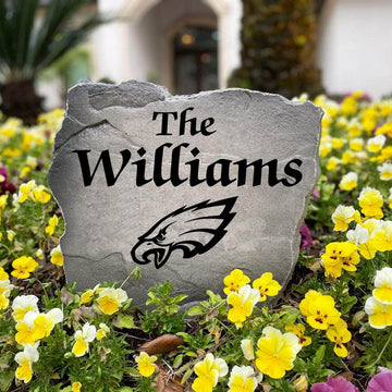 Officially licensed Philadelphia Eagles Name Stone handcrafted in the USA with custom family engraving and durable team artwork. This decorative garden stone enhances landscape beds, patios, and outdoor living spaces with lasting beauty and NFL team pride.