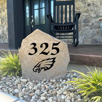 Decorative Philadelphia Eagles Address Stone featuring personalized house numbers permanently engraved into the stone surface alongside officially licensed team graphics. Perfect for driveways, patios, gardens, and landscape beds, this address marker celebrates Eagles football tradition.