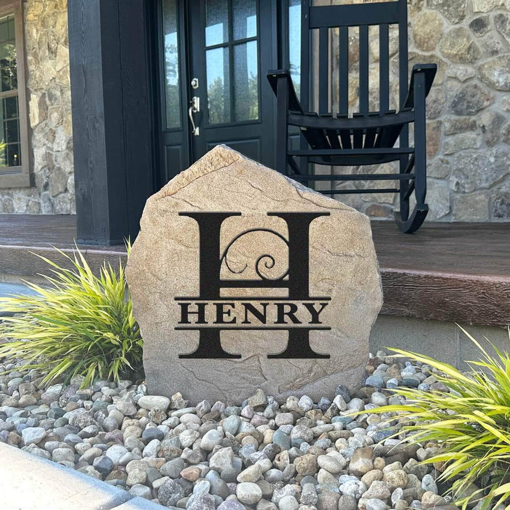 Handcrafted engraved Fancy Monogram monument combining graceful detailing with premium concrete construction for a striking landscape focal point.
