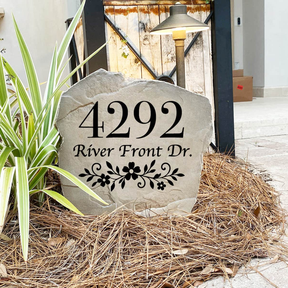 Personalized Floral Address Stone with custom house numbers and elegant floral artwork engraved directly into the stone surface. This engraved address stone adds curb appeal and creates a beautiful house number marker for front yards, gardens, walkways, and entryways. Proudly made in the USA and designed to provide a timeless, weather-resistant accent for any landscape