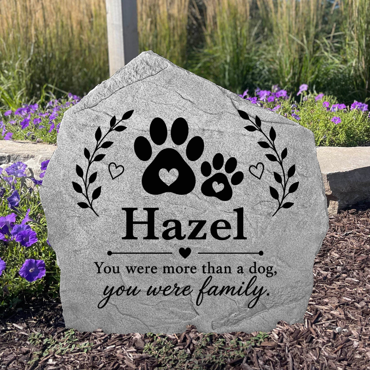 Custom engraved paw print memorial stone featuring the heartfelt message "Forever Loved" to honor a cherished dog or cat.