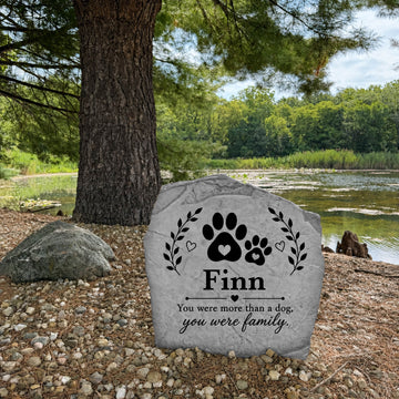 Personalized Forever Loved pet remembrance stone engraved directly into durable stone for a timeless outdoor memorial.