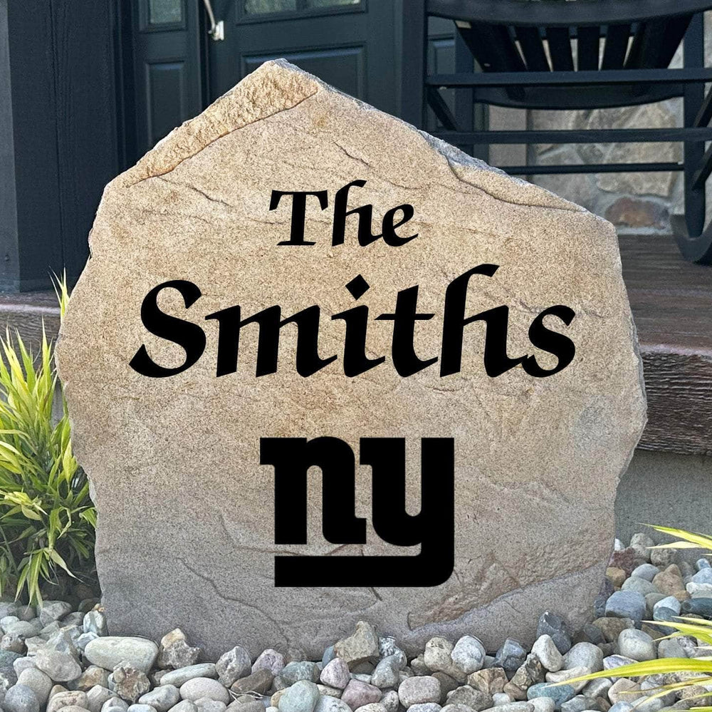Officially licensed New York Giants Name Stone featuring a personalized family name and the iconic New York Giants logo engraved directly into the stone surface. This custom garden stone adds NFL team pride and curb appeal to front yards, patios, gardens, and entryways.
