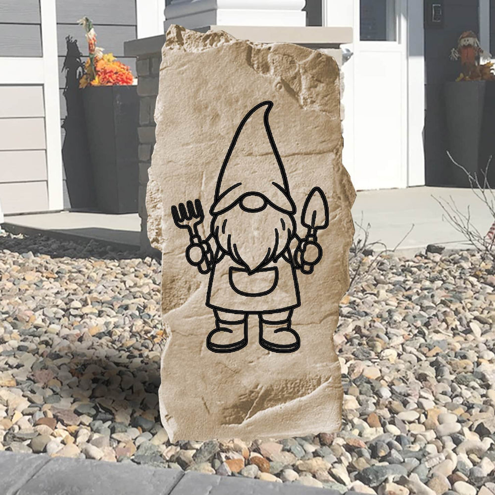 Nestled among blooming flowers and fresh mulch, the Vertical Gnome Stone brings cheerful personality to the garden with its engraved gnome design and tall profile. Perfect for adding a touch of whimsy, this charming accent creates a fun and inviting atmosphere along walkways, patios, or entryways.