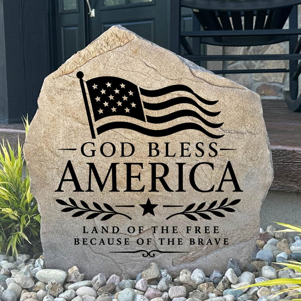Patriotic God Bless America Flag Stone featuring an engraved American flag and "God Bless America" design. This decorative landscape stone celebrates faith, freedom, and national pride while enhancing any outdoor space.