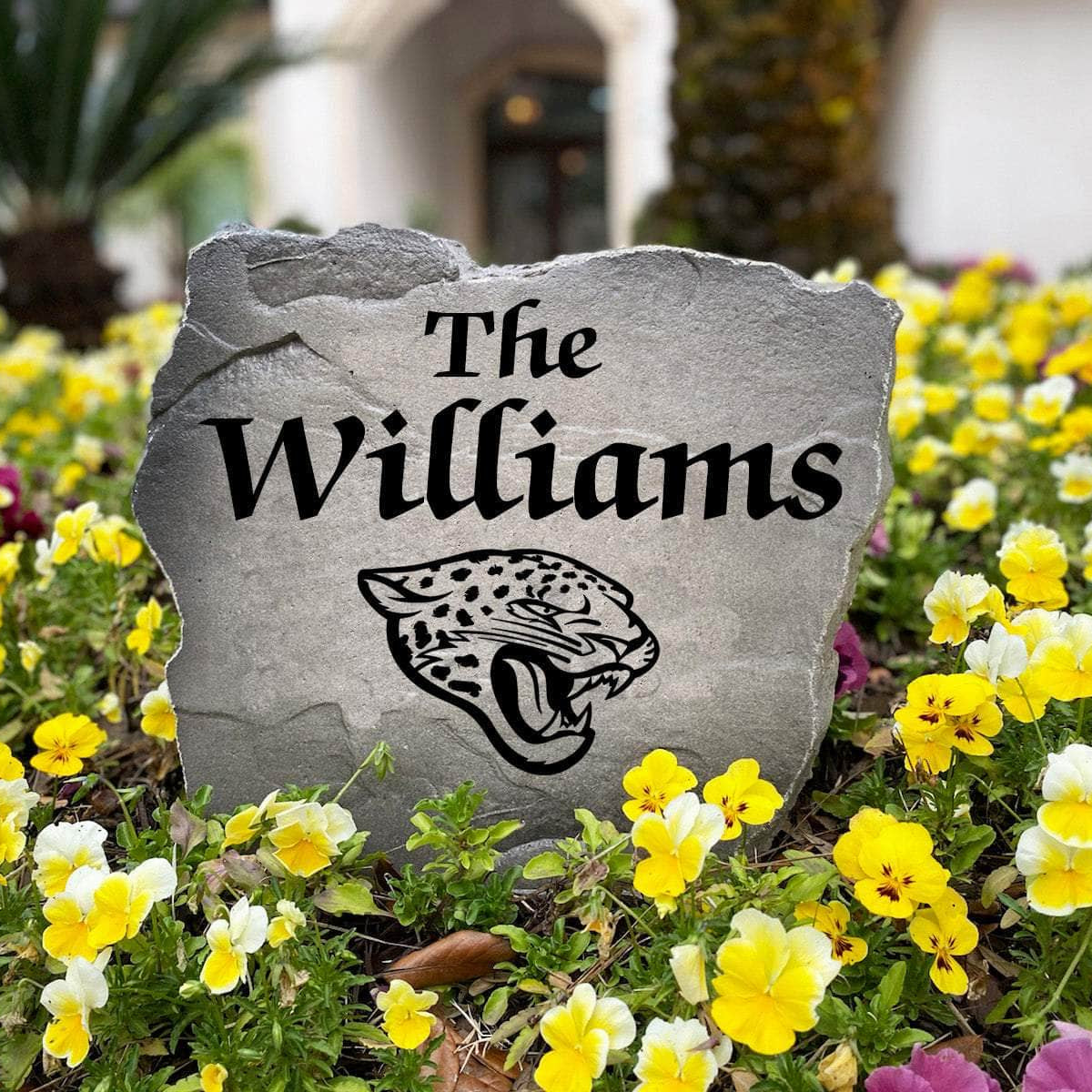Officially licensed Jacksonville Jaguars Name Stone handcrafted in the USA with custom family engraving and durable team artwork. This decorative garden stone enhances landscape beds, patios, and outdoor living spaces with lasting beauty and NFL team pride.
