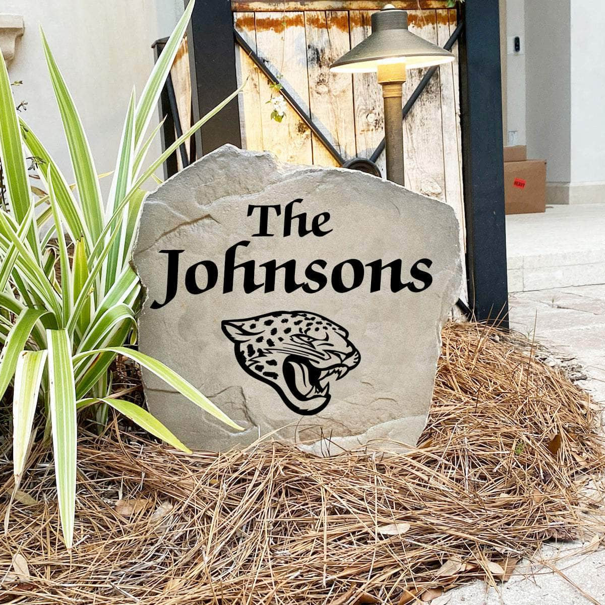 Engraved Jacksonville Jaguars Name Stone with a custom family name and the official Jacksonville Jaguars logo, bringing football spirit and timeless style to front yard landscapes, walkways, and home entrances.