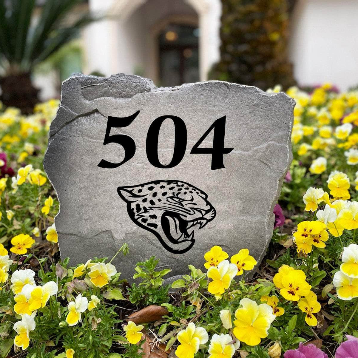 Officially licensed Jacksonville Jaguars Address Stone handcrafted in the USA with custom house numbers and durable engraved artwork. This weather-resistant address stone provides lasting beauty and curb appeal for football fans and outdoor spaces.