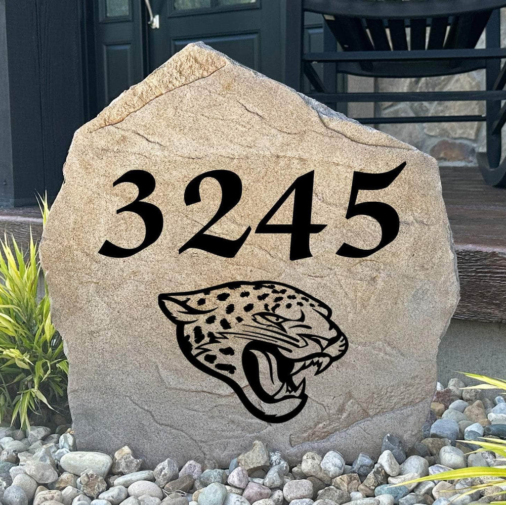 Officially licensed Jacksonville Jaguars Address Stone featuring custom house numbers and the iconic Jacksonville Jaguars logo engraved directly into the stone surface. This personalized address stone adds NFL team pride and enhances curb appeal for front yards, gardens, driveways, and entryways.