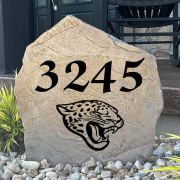 Officially licensed Jacksonville Jaguars Address Stone featuring custom house numbers and the iconic Jacksonville Jaguars logo engraved directly into the stone surface. This personalized address stone adds NFL team pride and enhances curb appeal for front yards, gardens, driveways, and entryways.