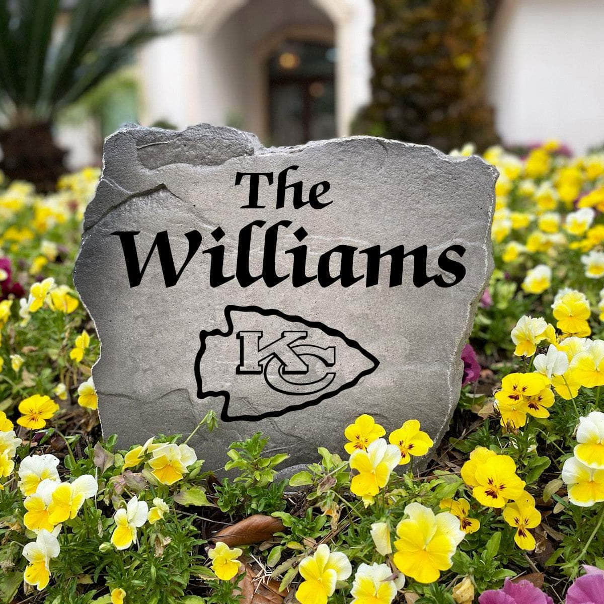 Officially licensed Kansas City Chiefs Name Stone handcrafted in the USA with custom family engraving and durable team artwork. This decorative garden stone enhances landscape beds, patios, and outdoor living spaces with lasting beauty and NFL team pride.
