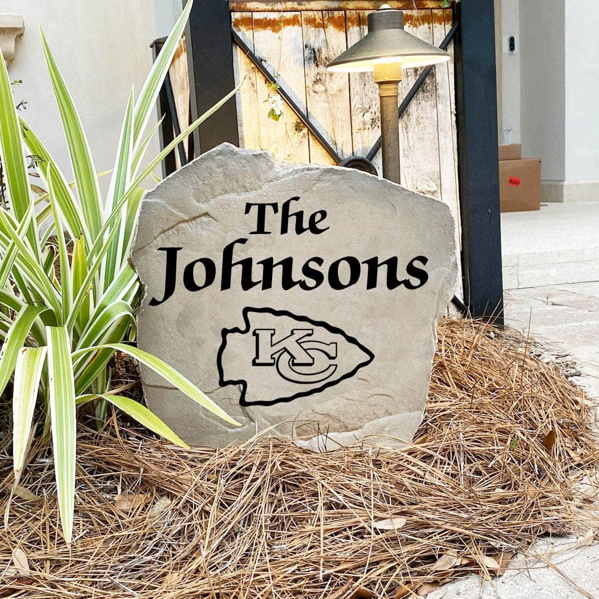 Engraved Kansas City Chiefs Name Stone with a custom family name and the official Kansas City Chiefs logo, bringing football spirit and timeless style to front yard landscapes, walkways, and home entrances.