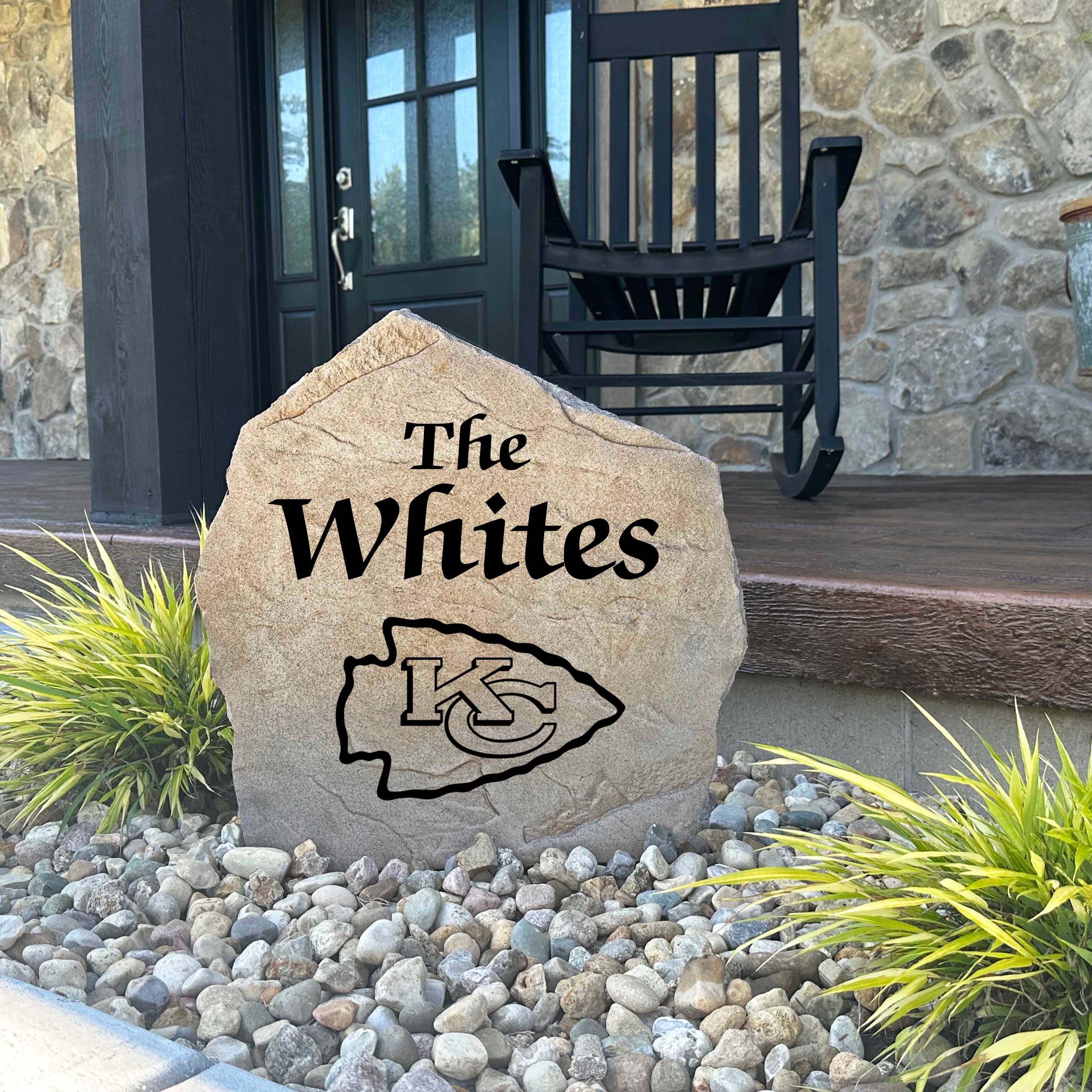 Decorative Kansas City Chiefs Name Stone featuring personalized family names permanently engraved into the stone surface alongside officially licensed team graphics. Perfect for gardens, patios, and entryways, this outdoor accent celebrates Kansas City Chiefs football tradition.
