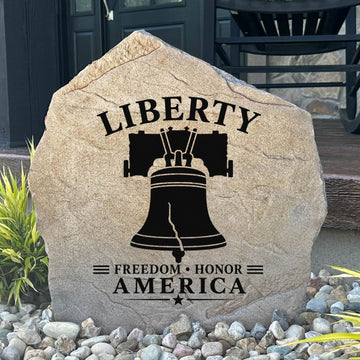 Patriotic Liberty Bell Stone featuring a beautifully engraved Liberty Bell design that celebrates American history, freedom, and independence. This decorative landscape stone adds timeless character to gardens, patios, walkways, and front entryways.