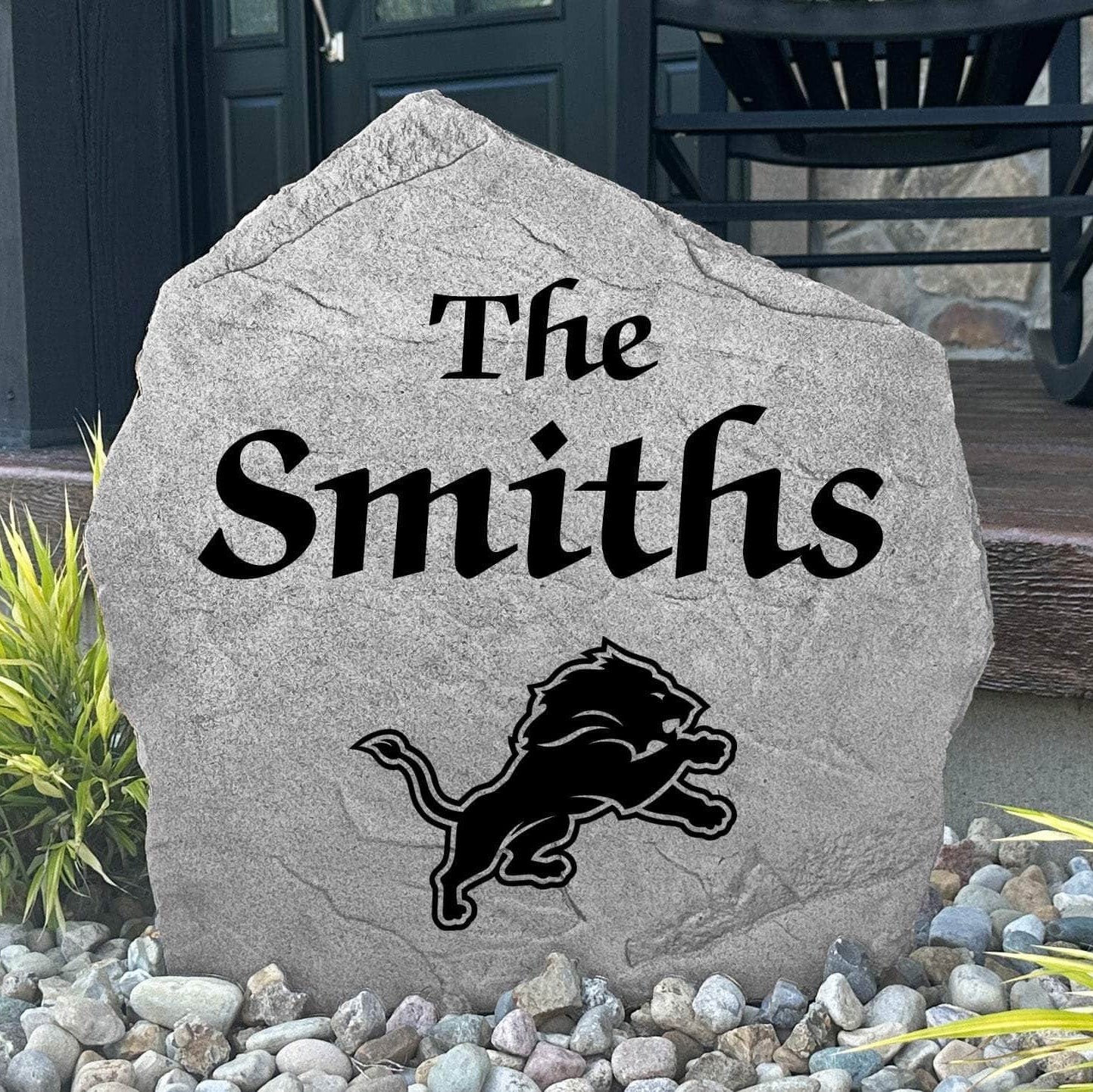 Officially licensed Detroit Lions Name Stone featuring a personalized family name and the iconic Detroit Lions logo engraved directly into the stone surface. This custom garden stone adds NFL team pride and curb appeal to front yards, patios, gardens, and entryways.