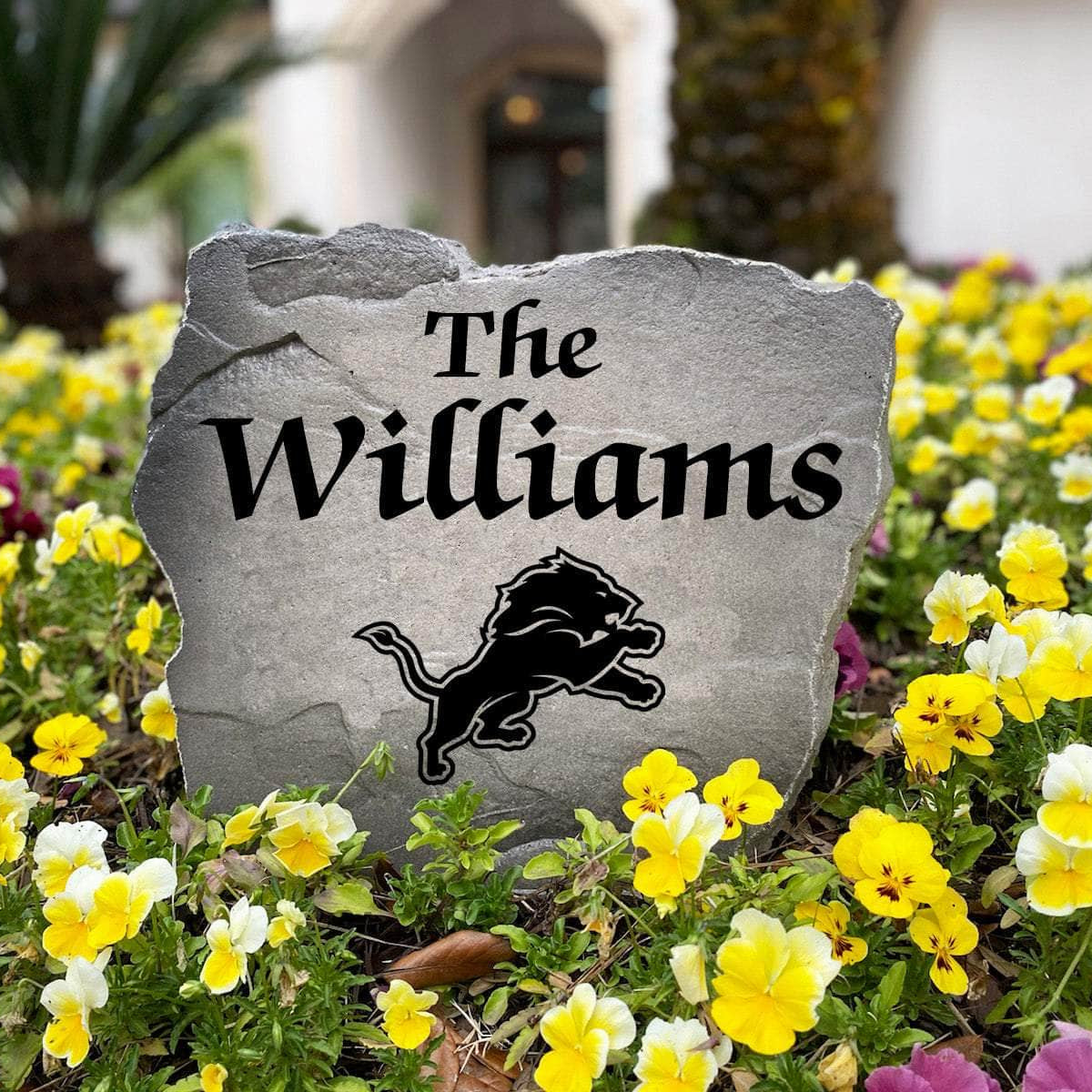 Decorative Detroit Lions Name Stone featuring personalized family names permanently engraved into the stone surface alongside officially licensed team graphics. Perfect for gardens, patios, and entryways, this outdoor accent celebrates Detroit Lions football tradition.