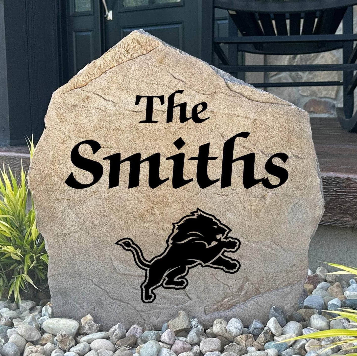 Officially licensed Detroit Lions Name Stone featuring a personalized family name and the iconic Detroit Lions logo engraved directly into the stone surface. This custom garden stone adds NFL team pride and curb appeal to front yards, patios, gardens, and entryways.