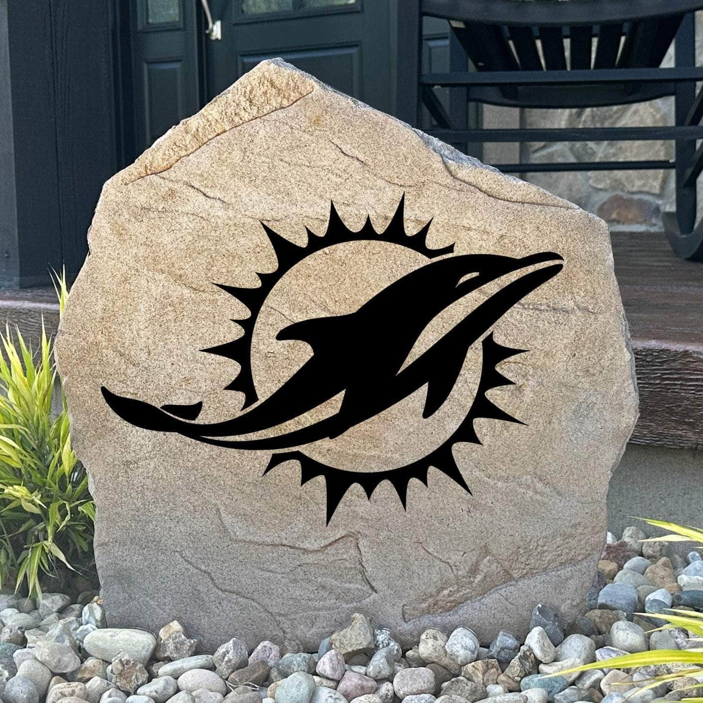 Officially licensed Miami Dolphins Logo Stone featuring the iconic Miami Dolphins logo engraved directly into the stone surface. This decorative garden stone adds NFL team spirit and curb appeal to front yards, patios, gardens, and entryways.