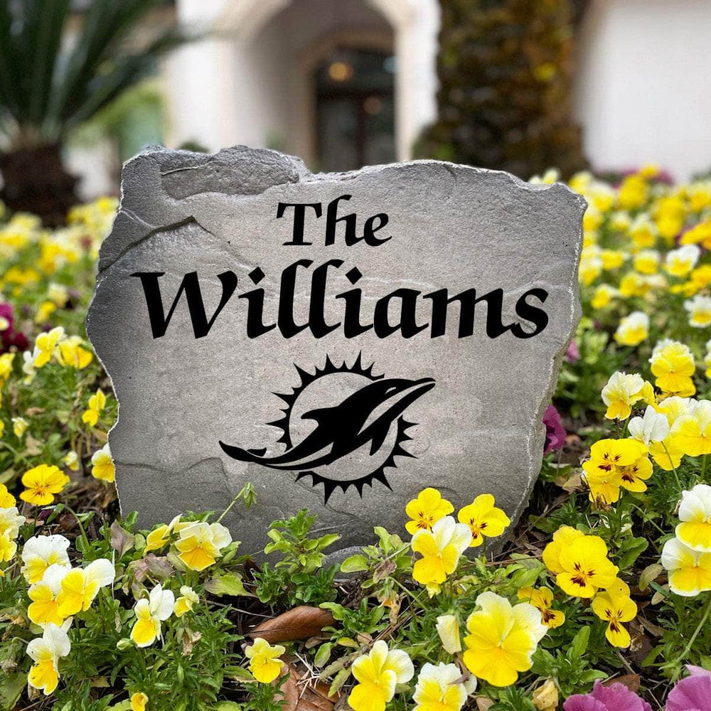 Officially licensed Miami Dolphins Name Stone handcrafted in the USA with custom family engraving and durable team artwork. This decorative garden stone enhances landscape beds, patios, and outdoor living spaces with lasting beauty and NFL team pride.