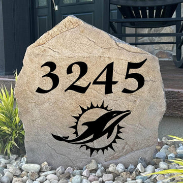 Officially licensed Miami Dolphins Address Stone featuring custom house numbers and the iconic Miami Dolphins logo engraved directly into the stone surface. This personalized address stone adds NFL team pride and enhances curb appeal for front yards, gardens, driveways, and entryways.