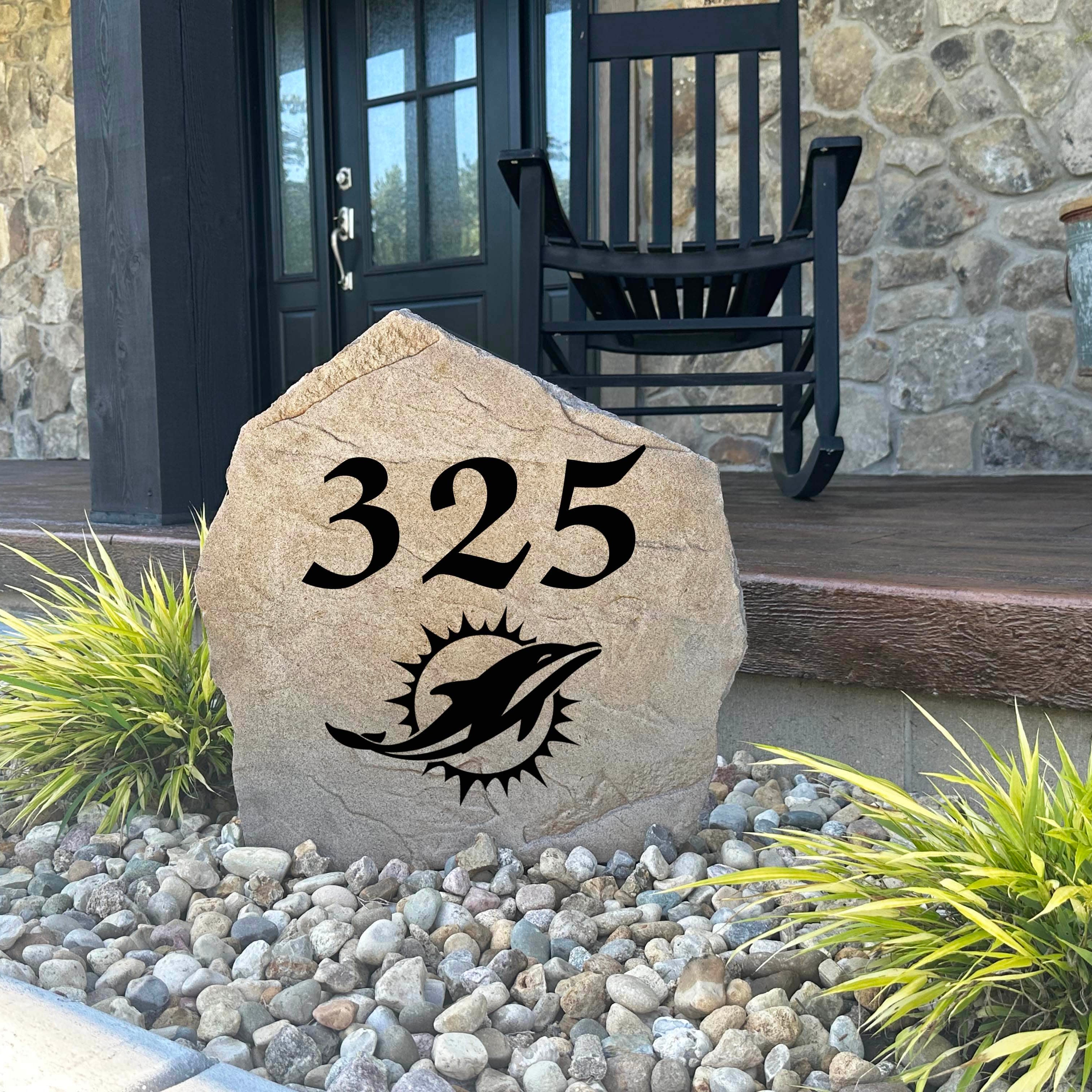 Decorative Miami Dolphins Address Stone featuring personalized house numbers permanently engraved into the stone surface alongside officially licensed team graphics. Perfect for driveways, patios, gardens, and landscape beds, this address marker celebrates Dolphins football tradition.