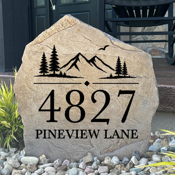 Personalized Mountain View Address Stone featuring custom house numbers and a scenic mountain landscape engraved directly into the stone surface. This decorative address marker enhances curb appeal and creates a welcoming entrance to your home.