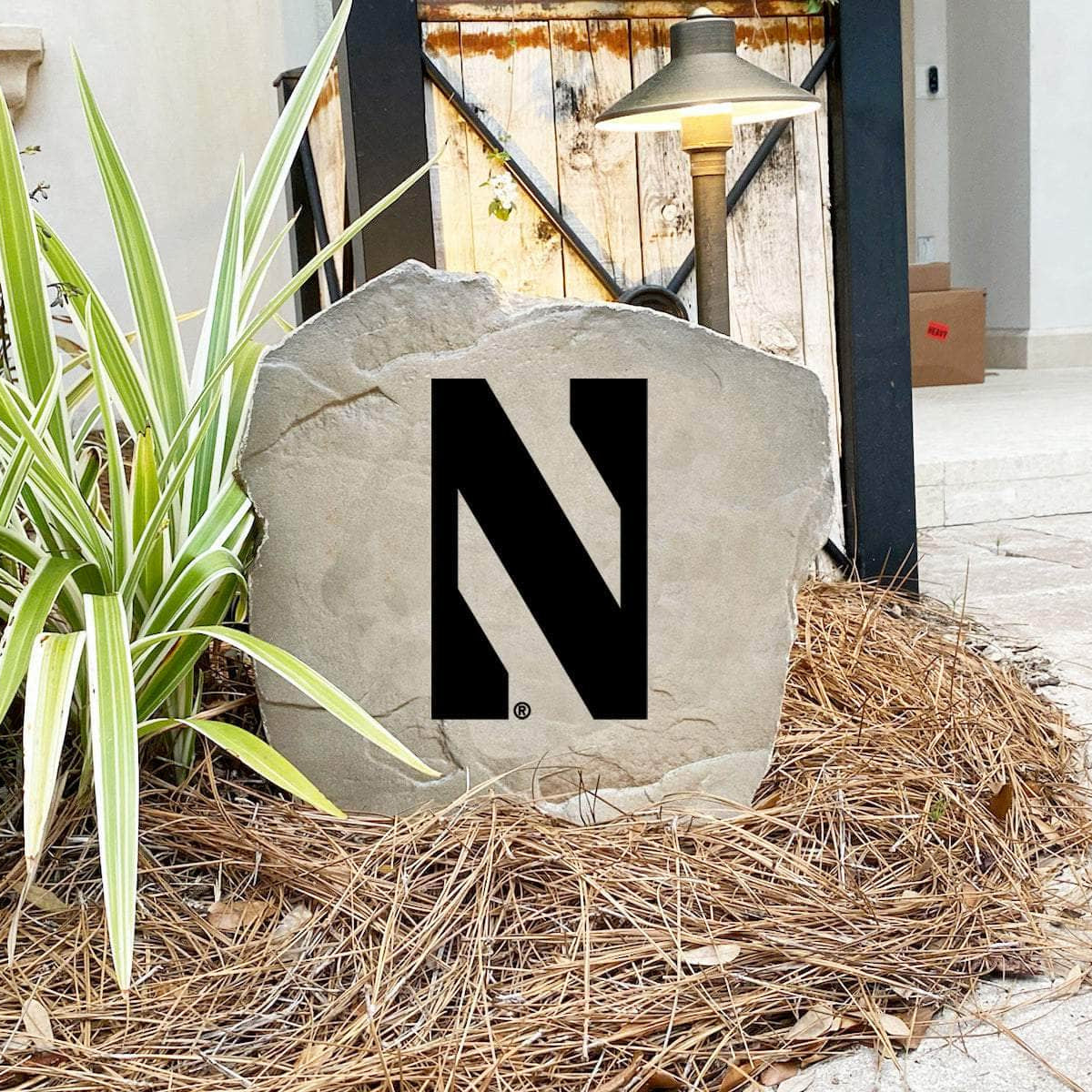 Northwestern University outdoor logo marker designed to celebrate Wildcats tradition while enhancing walkways, flower beds, and residential entryways.

