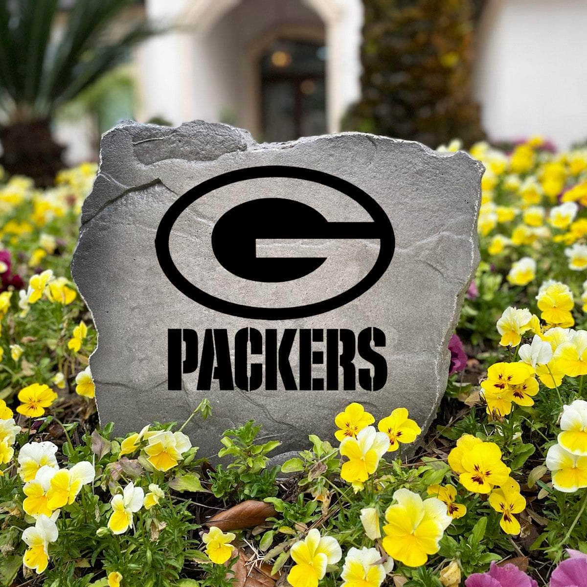 Officially licensed Green Bay Packers Logo Stone handcrafted in the USA with detailed team engraving and weather-resistant durability. Available in Sandstone and Greystone finishes, this decorative garden stone enhances outdoor spaces with lasting beauty and Packers spirit.