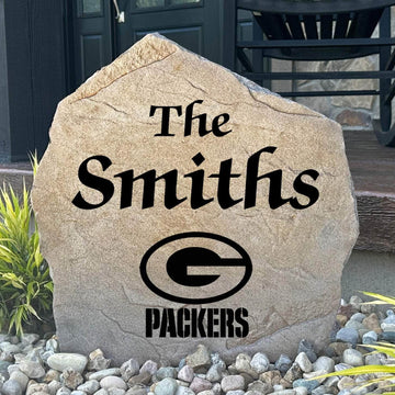Officially licensed Green Bay Packers Name Stone featuring a personalized family name and the iconic Green Bay Packers logo engraved directly into the stone surface. This custom garden stone adds NFL team pride and curb appeal to front yards, patios, gardens, and entryways.