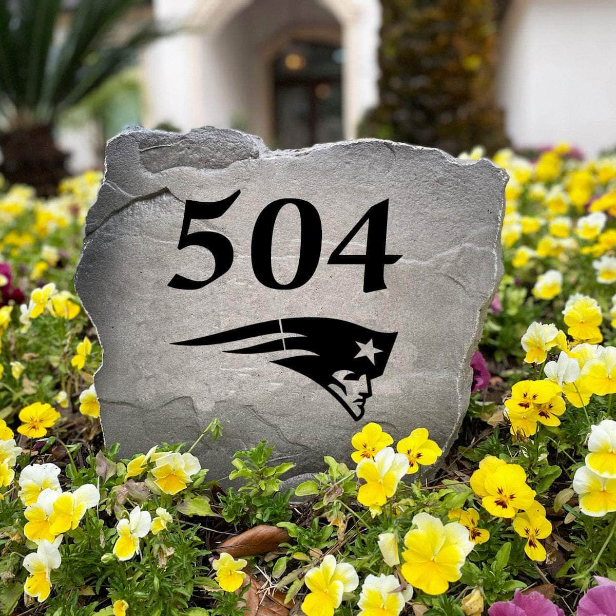 Officially licensed New England Patriots Address Stone handcrafted in the USA with custom house numbers and durable engraved artwork. This weather-resistant address stone provides lasting beauty and curb appeal for football fans and outdoor spaces