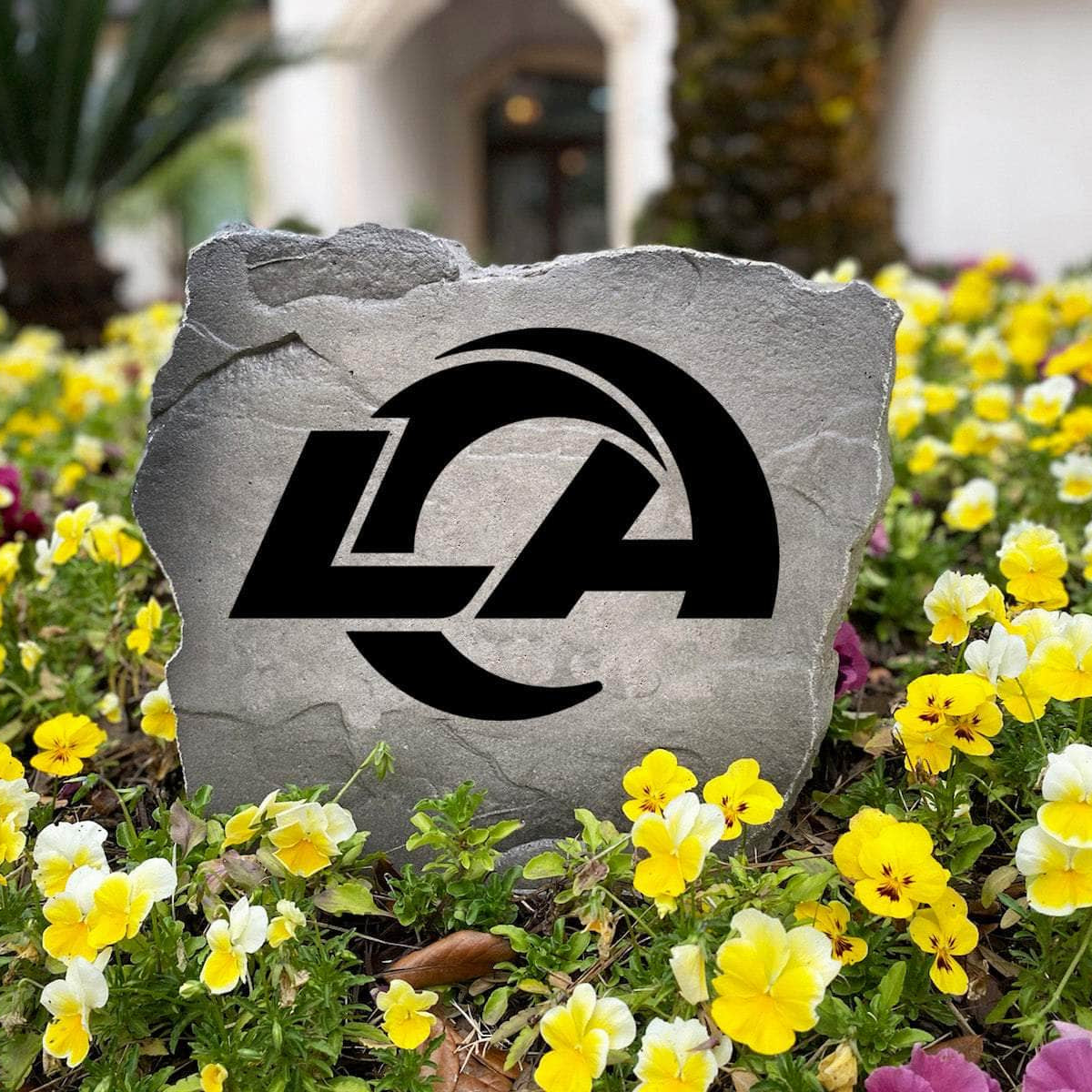 Officially licensed Los Angeles Rams Logo Stone handcrafted in the USA with detailed team engraving and weather-resistant durability. This decorative garden stone enhances outdoor spaces with lasting beauty and NFL team spirit.