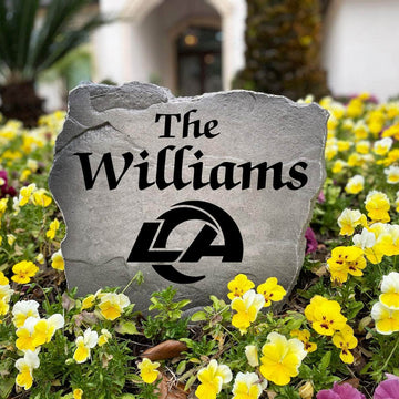Officially licensed Los Angeles Rams Name Stone handcrafted in the USA with custom family engraving and durable team artwork. This decorative garden stone enhances landscape beds, patios, and outdoor living spaces with lasting beauty and NFL team pride.