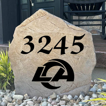 Officially licensed Los Angeles Rams Address Stone featuring custom house numbers and the iconic Los Angeles Rams logo engraved directly into the stone surface. This personalized address stone adds NFL team pride and enhances curb appeal for front yards, gardens, driveways, and entryways.