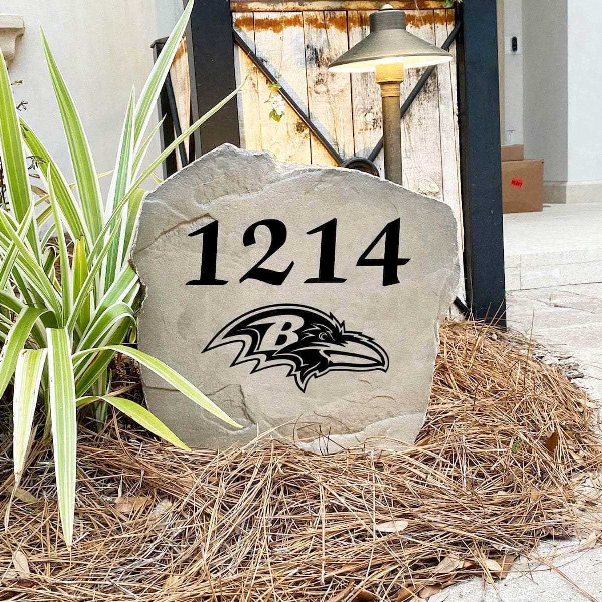 Handcrafted Baltimore Ravens Address Stone proudly made in the USA with deeply engraved house numbers and officially licensed NFL artwork. Available in Sandstone and Greystone finishes for lasting outdoor durability.