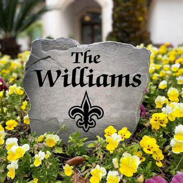 Officially licensed New Orleans Saints Name Stone handcrafted in the USA with custom family engraving and durable team artwork. This decorative garden stone enhances landscape beds, patios, and outdoor living spaces with lasting beauty and NFL team pride.