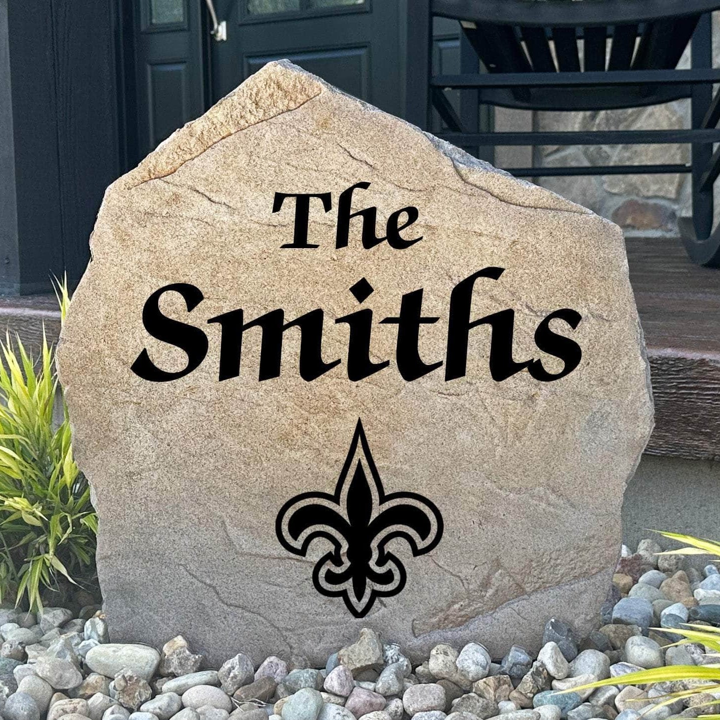 Officially licensed New Orleans Saints Name Stone featuring a personalized family name and the iconic New Orleans Saints logo engraved directly into the stone surface. This custom garden stone adds NFL team pride and curb appeal to front yards, patios, gardens, and entryways.