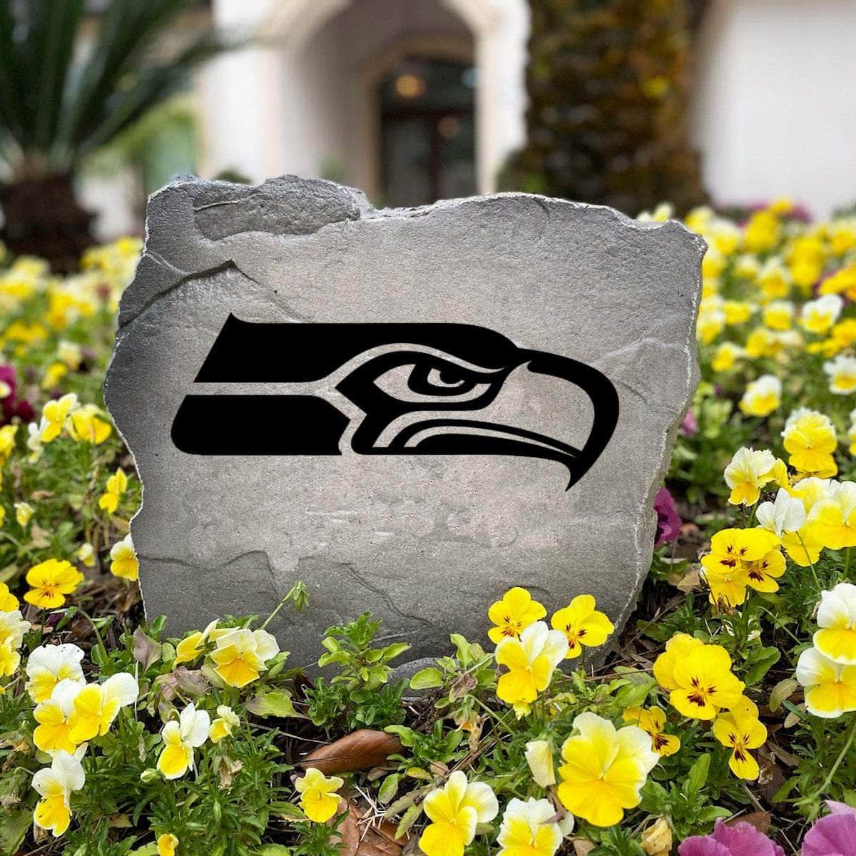 Officially licensed Seattle Seahawks Logo Stone handcrafted in the USA with detailed team engraving and weather-resistant durability. This decorative garden stone enhances outdoor spaces with lasting beauty and NFL team spirit.