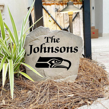 Engraved Seattle Seahawks Name Stone with a custom family name and the official Seattle Seahawks logo, bringing football spirit and timeless style to front yard landscapes, walkways, and home entrances.