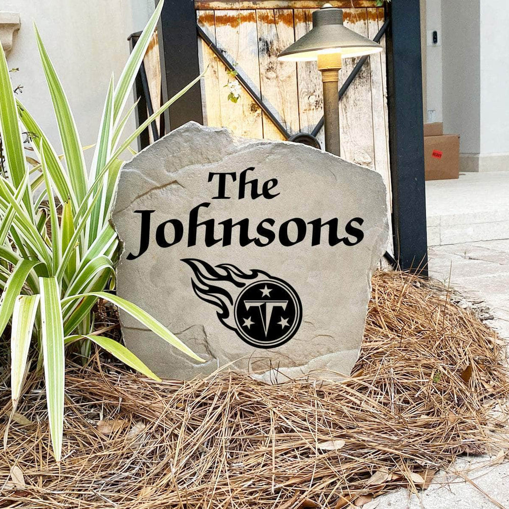 Engraved Tennessee Titans Name Stone with a custom family name and the official Tennessee Titans logo, bringing football spirit and timeless style to front yard landscapes, walkways, and home entrances.